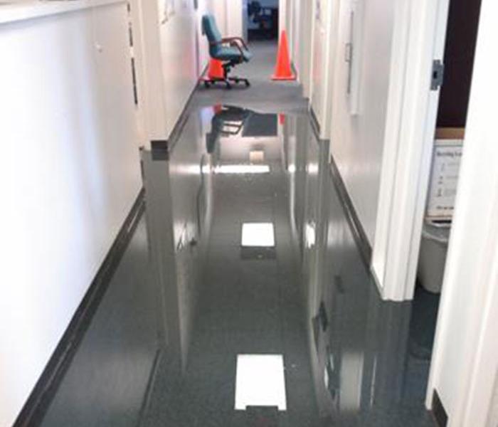 Standing water in a commercial hallway