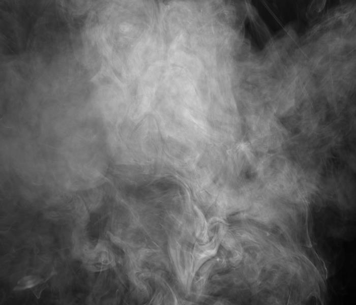 White smoke on a black background 